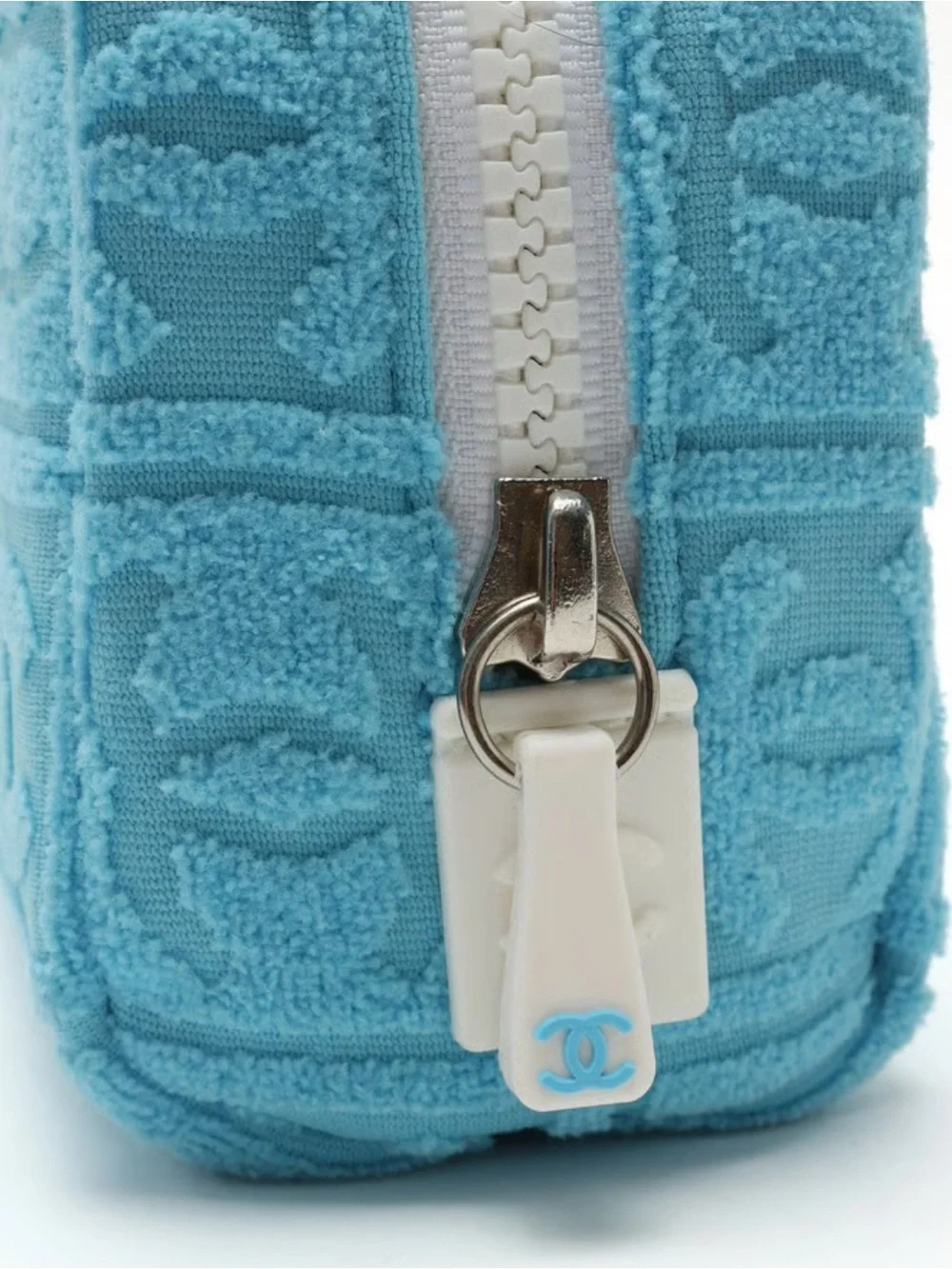 CHANEL Light Blue Embossed CC Terry Zip Pouch